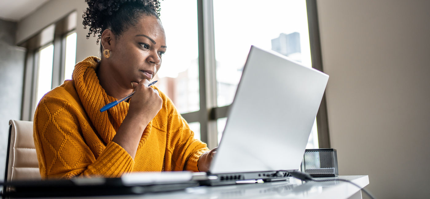 Image: Travel advisor working from the home office. (Photo Credit: Drs Producoes/E+)