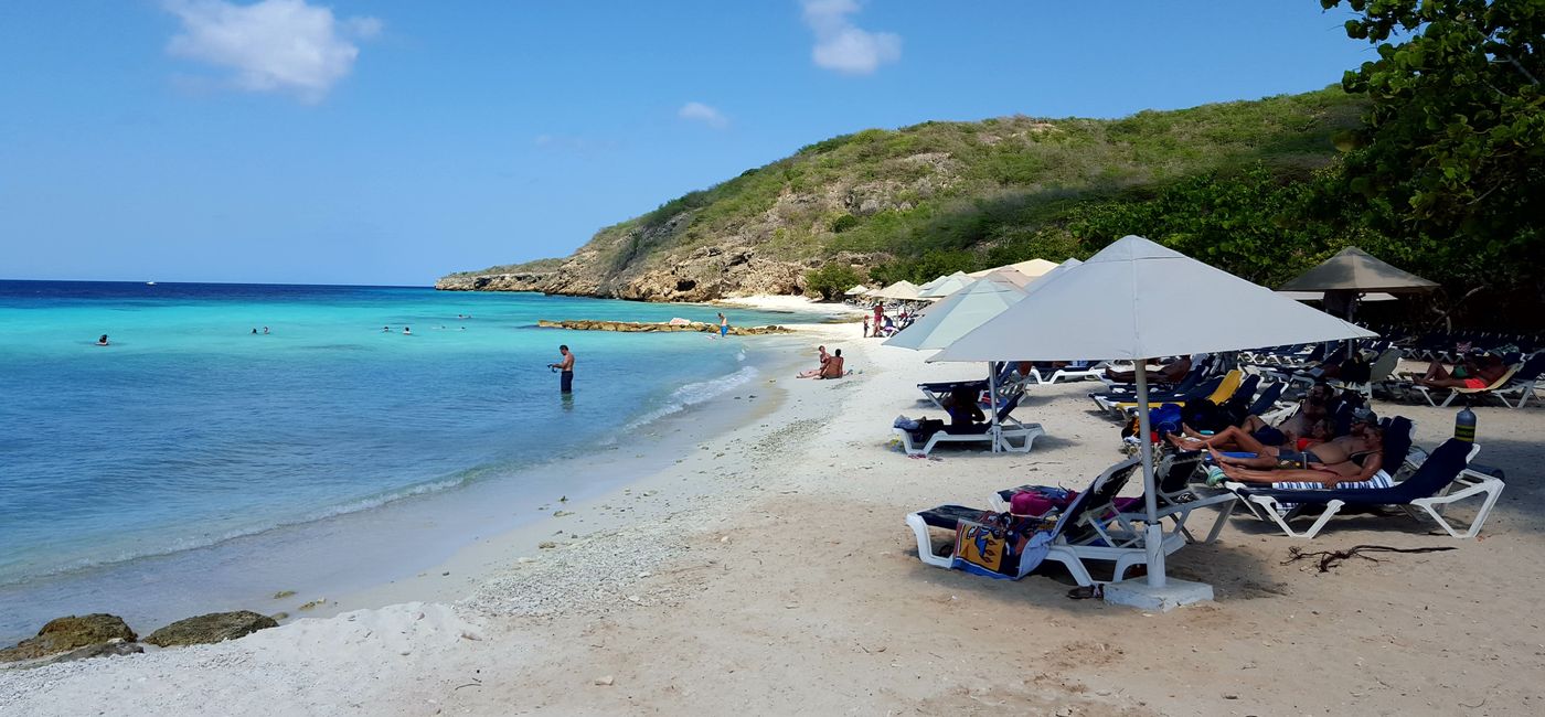 Image: Vacationers at Porto Mari beach in Curacao (Photo Credit: Brian Major)