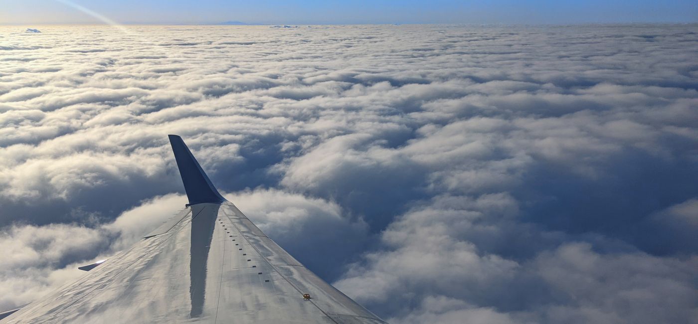 Image: Window seat views while flying on an airplane (photo by Lauren Bowman)