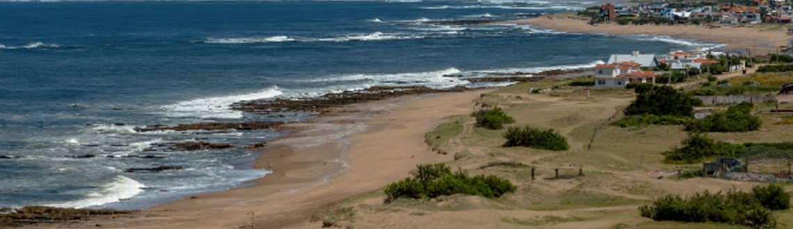 The beaches of Uruguay invite visitors to rest and enjoy them with their families. (Photo via MarcosMartinezSanchez/iStock/Getty Images Plus).