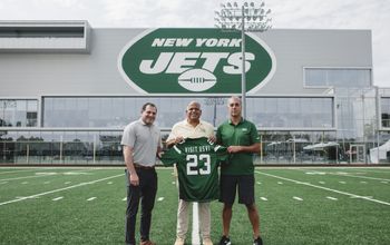 U.S. Virgin Islands Tourism Commissioner Joseph Boschulte with Jets officials