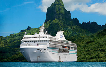 Cruise ship in Bora Bora near mountain (PHOTO: Photo via Paul Gauguin cruises)