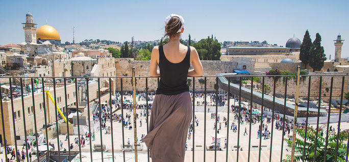 Women looks on at Jerusalem old city, Israel